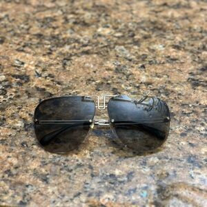 Stylish Black Givenchy Sunglasses with gold accents